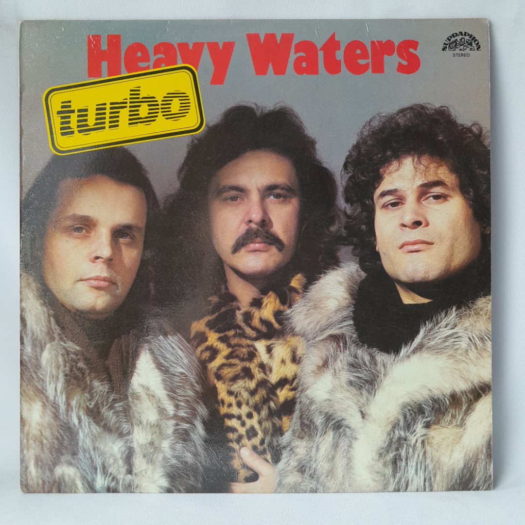 Виниловая пластинка "Heavy waters"Turbo. Незначительные царапины. Картинка 1