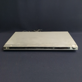 DVD плеер "LG" DV656Х, рабочий, есть небольшая вмятина. Китай.
