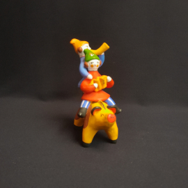 Дымковская глиняная игрушка Скоморох на свинье ,высота 12 см,винтаж Россия