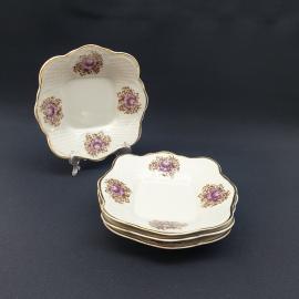 Набор тарелок для закусок из 4 штук , Коростень, деколь, позолота, рельефный фарфор. СССР