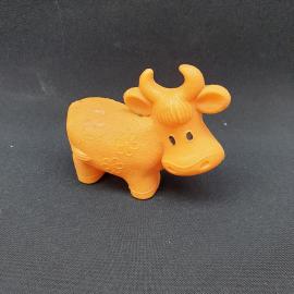 Игрушка винтажная, СССР. Резиновая фигурка коровы с цветочным рисунком, оранжевая
