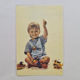 Карманный календарик СССР 1991. Страхование детей, ребенок с игрушками. Советский календарь