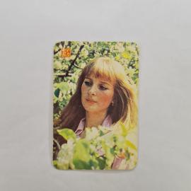 Карманный календарик СССР 1987. Страхование жизни, девушка среди цветов. Советский календарь