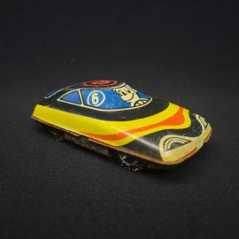 Машинка жестяная винтажная, СССР. Инерционная игрушка с рисунком водителя, металл