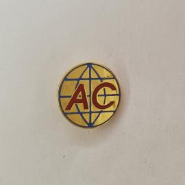 Значок СССР. Буквы AC на фоне глобуса, международная тематика. Винтажный значек.