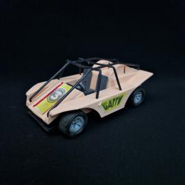Винтажная игрушечная машинка в стиле багги  выразительный предмет с ярко узнаваемой ретро-эстетикой.