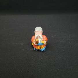 Статуэтка винтажная, СССР. Расписная миниатюрная фигурка казака с трубкой и бандурой