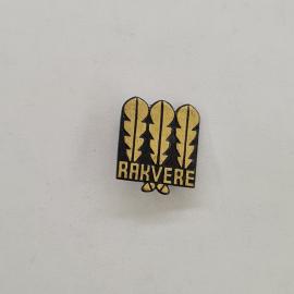 Значок СССР. Три желтые стилизованные перья и надпись Rakvere. Винтажный значек.
