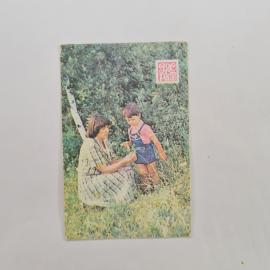 Карманный календарик 1987. Мать с ребенком на природе, цветы и зелень. Календарь винтажный