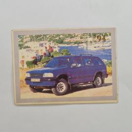 Карманный календарик 1994. Автомобиль Опель Фронтера на фоне моря и домов. Календарь винтажный