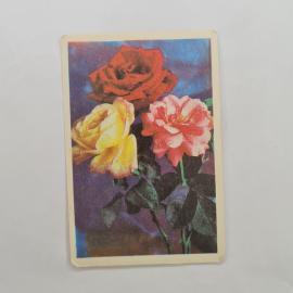 Карманный календарик 1986. Розы на фоне, цветы в разных оттенках. Календарь винтажный