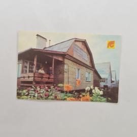 Карманный календарик 1990. Строительные мотивы и цветы на фоне дачного дома. Календарь винтажный