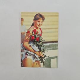 Карманный календарик СССР 1991. Легкоатлетка с букетом роз, спортивная тематика. Советский календарь