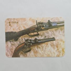 Карманный календарик СССР 1988. Тула, художественно оформленные ружье и пистолет. Советский календар