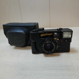 Фотоаппарат "Эликсон 35С" - программный автомат из пластика с объективом "Индустар-95", СССР. Картинка 1