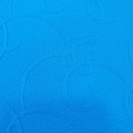 Ткань (синтетика), тянется, цвет ярко-голубой, выпуклый рисунок, 150х140см.