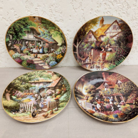Декоративные коллекционные тарелки (4 шт.) с росписью художника Робера Херси.